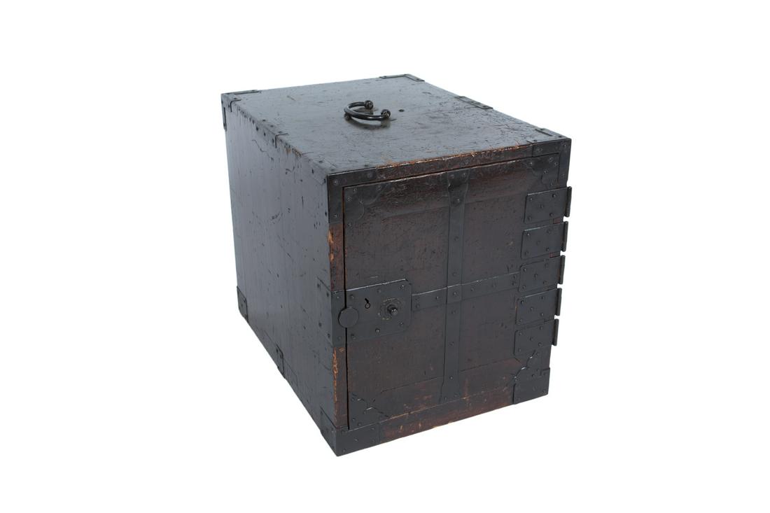 JAPANESE MEIJI PERIOD (1868-1912) SEA TRUNK WITH HIDDEN: An antique sea storage chest with two long over two short over two deep drawers, behind a cabinet door with iron hardware, circa 1860 15 3/4 by 13 1/2 by 18 1/2 inches Fine Art