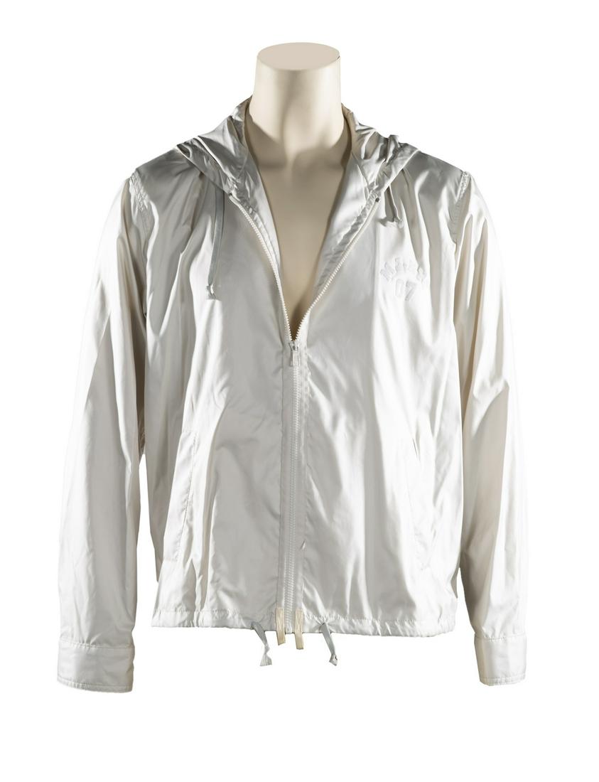 THREE DESIGNER OUTERWEAR JACKETS: A group of three items, including: a bone Marc Jacobs windbreaker, size 52; a beige Brioni jacket; and a grey cotton velvet YSL lined jacket. Fine Art