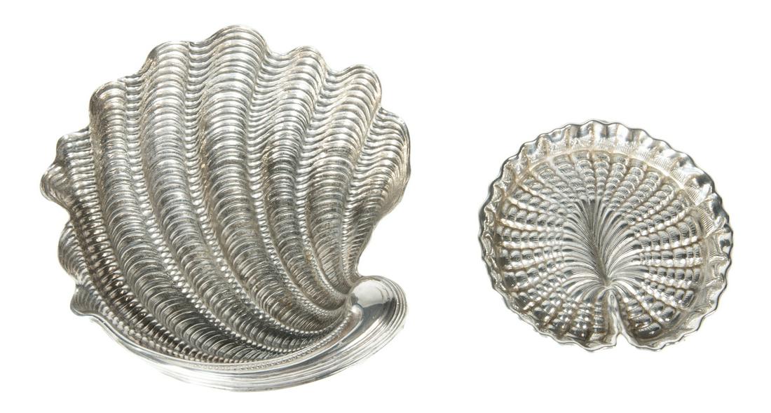 TWO BUCCELLATI STERLING SILVER BOWLS: A group of two, including: a large Tridacna shell bowl , and a medium Waterlilly bowl. Total weight, 9.30 troy oz. Largest, 6 1/2 by 6 inches Fine Art