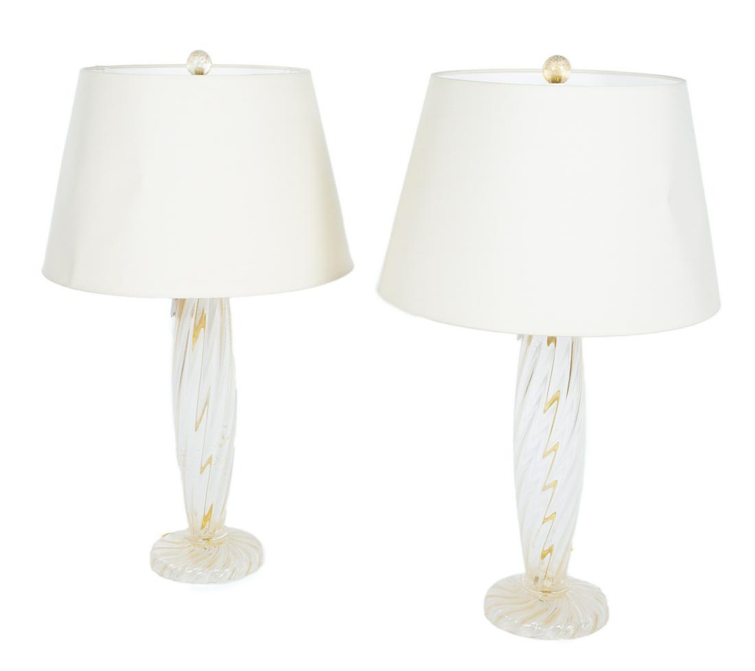 PAIR OF DONGHIA GILT MURANO TABLE LAMPS: A pair of swirled gilt Murano glass two light table lamps designed by John Hutton for maker Donghia. Height, 31 inches Fine Art