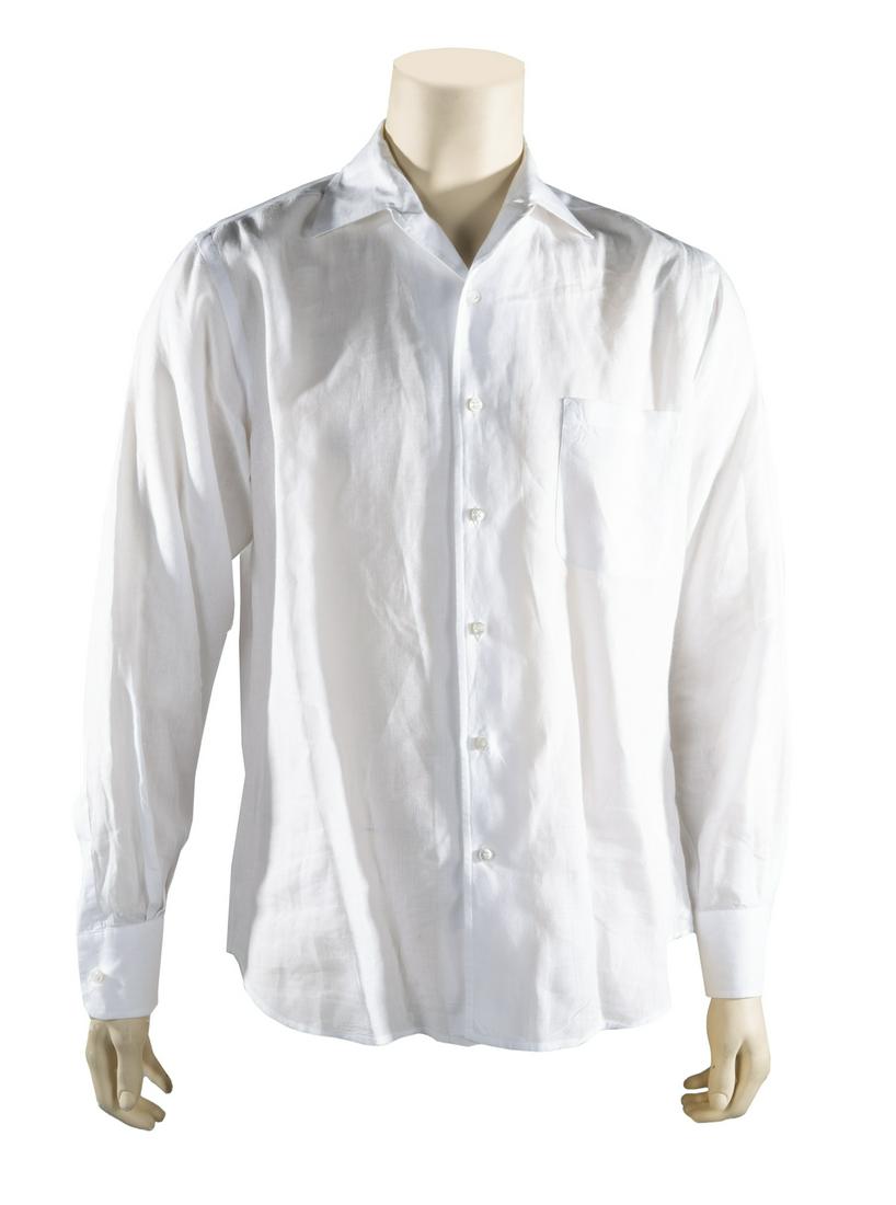 FIVE WHITE DESIGNER SHIRTS: A group of five luxury brand cotton or linen shirts, including: three by Dior, size 42 and 43; a monochrome striped shirt by Gucci, size 43/17; and a linen shirt by Loro Piana. Fine Art