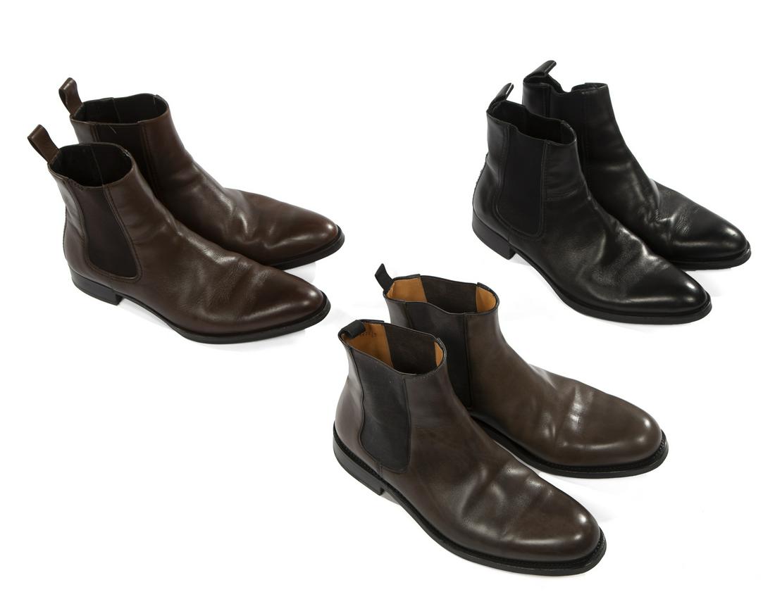 DESIGNER ANKLE BOOTS IN ASSORTED COLORS: A group of three pairs of leather boots, including: an olive pair by Marc Jacobs, size 9; a brown pair by Gucci, size 9 1/2 D; and a black pair by Gucci, size 9 1/2 D. Fine Art