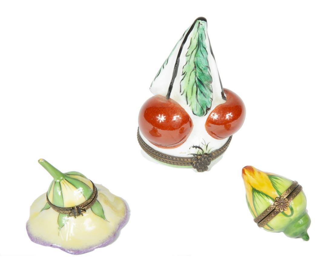 LIMOGES VEGETABLE TRINKET BOXES: A group of three vegetable themed Limoges boxes, including beets and squash. Tallest, height, 3 1/2 inches Fine Art
