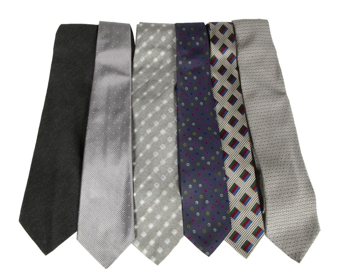 SIX GREY DESIGNER NECKTIES: A group of six silk and wool neckties in assorted patterns, by makers Ermenegildo Zegna, Comme des Garcons, Prada, Giorgio Armani (2), and Alexander Julian. Fine Art