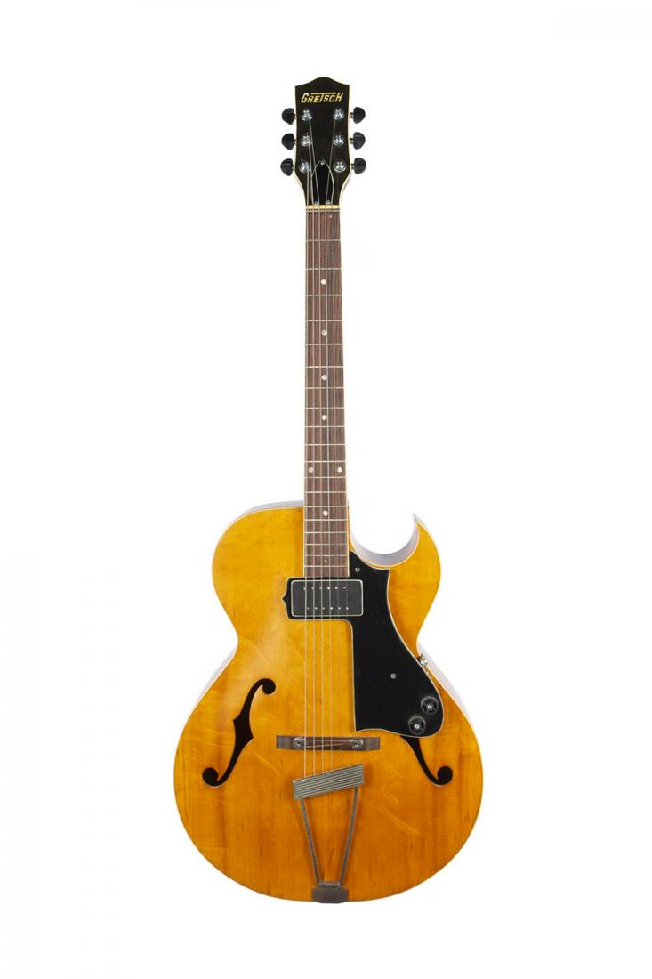 CUSTOM ARCHTOP GUITAR: A custom archtop guitar, natural finish, no serial number, single florentine cutaway body with F-holes and one forward neck pickup. Includes a hard-shell case. From the Bachman-Gretsch Collection. 41 