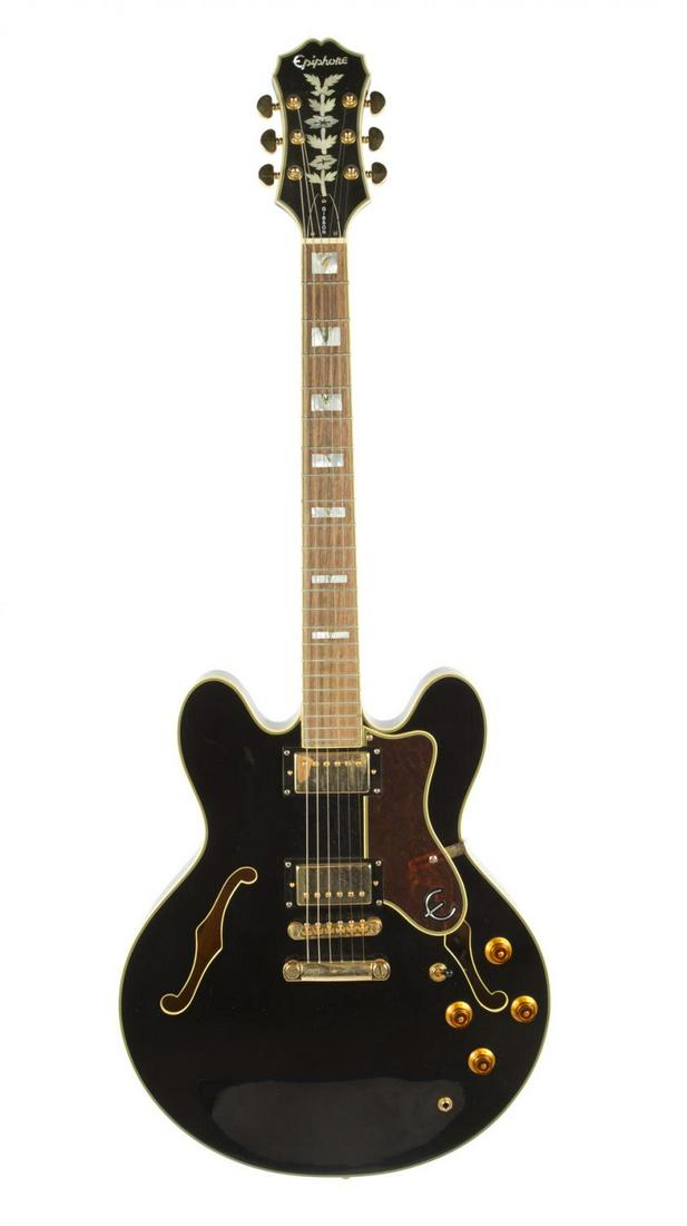 GIBSON EPIPHONE SHERATON GUITAR: A Gibson Epiphone Sheraton electric guitar, Japanese, thinline double cutaway, no serial number, two pickups, gold hardware and block inlays. Comes with a gig bag, Rock 'N' Roll