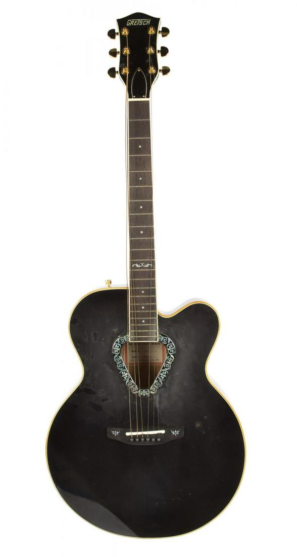 GRETSCH 6030D ACOUSTIC GUITAR: A Gretsch 6030D acoustic guitar, black finish, serial number 9190308, dot inlays and no case. Rock 'N' Roll