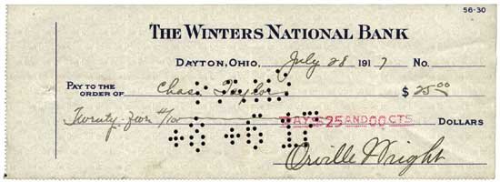 Orville Wright Desirable Signed Bank Check: to Charles Taylor. Desirable signed bank check, 8.5 x 3, The Winters National Bank, July 28, 1917, payable to Charles Taylor for the sum of $25.00. Boldly signed in full, "Orville Wright," in black fo