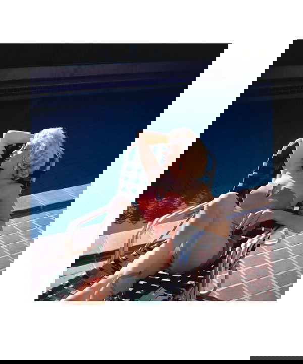 MARILYN MONROE HAROLD LLOYD PHOTOGRAPH PRINT: A limited edition poster print (25/250) featuring a color image of Marilyn (c.1952) during the filming of "How to Marry a Millionaire" (20th Century Fox). Marilyn posed for publicity shots at former s