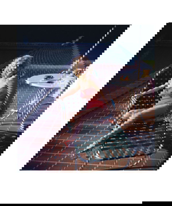 MARILYN MONROE HAROLD LLOYD PHOTOGRAPH PRINT: A limited edition poster print (25/250) featuring a color image of Marilyn (c.1952) during the filming of "How to Marry a Millionaire" (20th Century Fox) Marilyn posed for publicity shots at former si