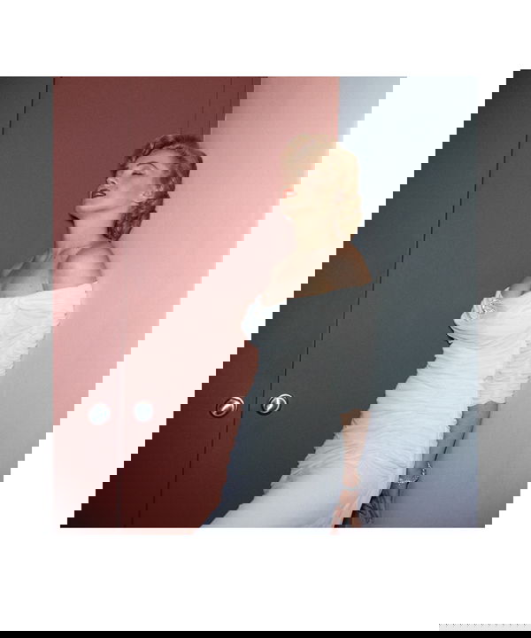 MARILYN MONROE HAROLD LLOYD PHOTOGRAPH PRINT: A limited edition poster print (25/250) featuring a color image of Marilyn (c.1952) in a white strapless dress. The photo was taken by silent screen star turned photographer Harold Lloyd during a phot