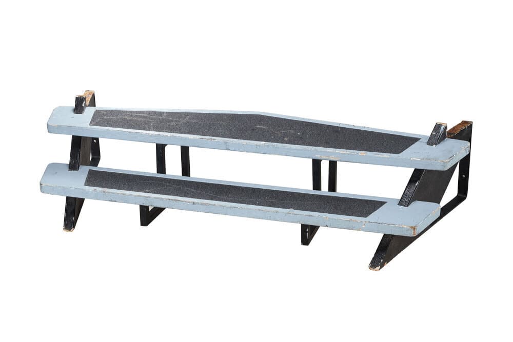 STAR TREK EXHIBITION | USS ENTERPRISE STEP: An original custom-made step built for a Star Trek exhibition featuring a model of the USS Enterprise. The steps are composed of wood and have been painted blue. The supports are a combination of meta
