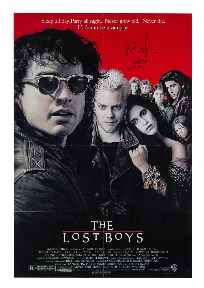 THE LOST BOYS | ALEX WINTER SIGNED FILM POSTER: A one sheet film poster for Joel Schumacher's The Lost Boys (Warner Bros., 1987) signed by Alex Winter (who has also inscribed his character name, "Marko"). 40 x 27 inches; 13.5 x 10 inches (folded);