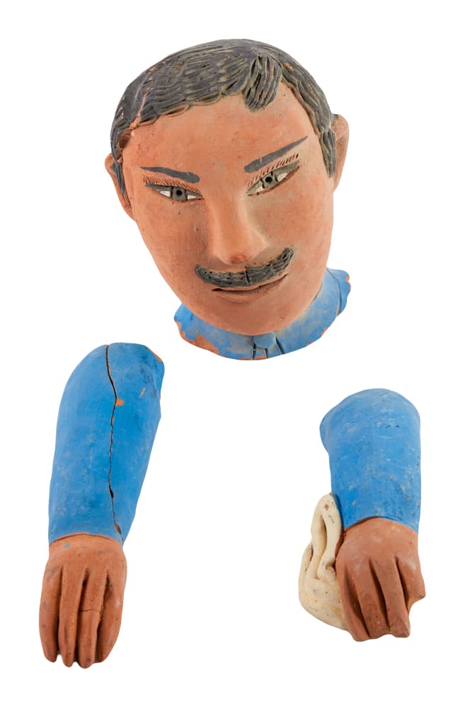 DENNIS HOPPER | POTTERY FIGURE HEAD AND ARMS: A pottery head and arms from a broken figure of a man from the collection of Dennis Hopper. Approx. 6 x 6 x 6 inches (overall) PROVENANCE Property from the Life and Career of Dennis Hopper;