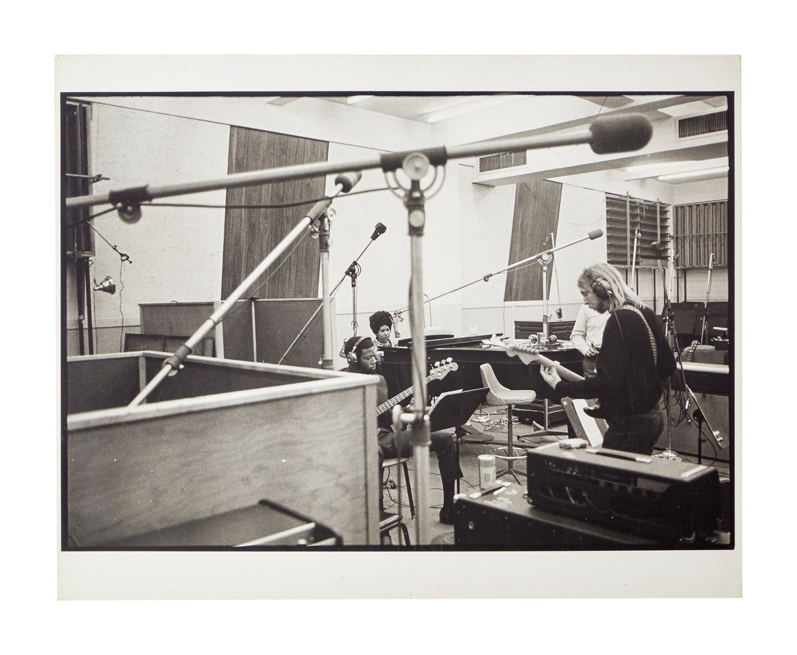 ARETHA FRANKLIN | AND DUANE ALLMAN ORIGINAL 1970 BLACK AND WHITE PHOTO: An original black and white photograph of Aretha Franklin and Duane Allman, taken by photographer Stephen Paley in 1970. The back of the photograph has a stamp that reads "Photo By Stephen Paley,
