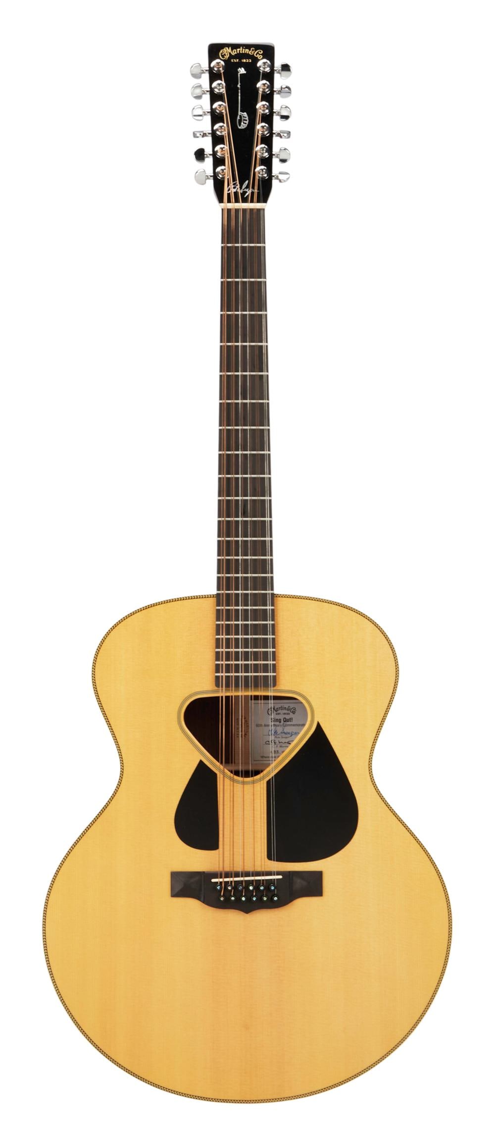 MARTIN | 2011 MARTIN CUSTOM ARTIST "SING OUT" PETE SEEGER ANNIVERSARY MODEL GUITAR: 2011 Martin Custom Artist “Sing Out’ Anniversary Pete Seeger model, serial number 1537832, in natural finish. This 60th Anniversary Pete Seeger, baritone guitar was created for the 60th an