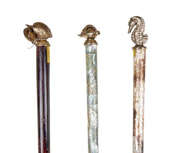 ZZ TOP | DUSTY HILL MAITLAND SMITH WALKING STICKS: Three sea creature themed walking sticks by Maitland and Smith including a silver-tone metal starfish on shell with abalone mosaic stick, a silver-tone metal seahorse with mother of pearl mosaic stick