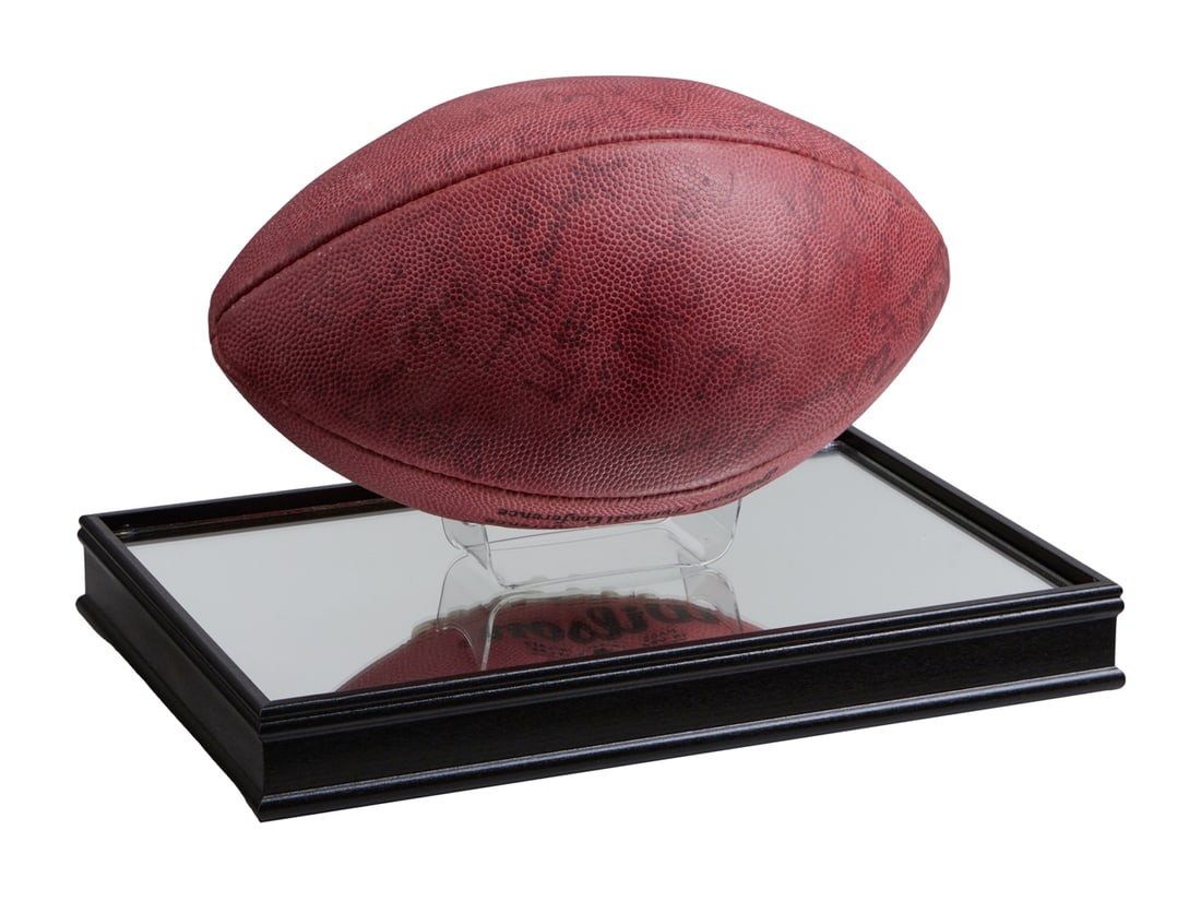 ZZ TOP | DUSTY HILL HOUSTON OILERS SIGNED FOOTBALL: An NFL Wilson football signed by 15 members of the 1985-1986 Houston Oilers including: Warren Moon, Mike Rozier, Ray Childress, Patrick "Doc" Allen, Mike Munchak, Robert Abraham, Steve Brown