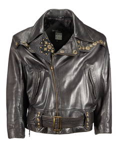 ZZ TOP | DUSTY HILL NORTH BEACH LEATHERS JACKET: A black leather motorcycle jacket by Michael Hoban, North Beach Leathers, heavily embellished with metal studs and a large studded cross on the back, size 44. PROVENANCE From The Estate of Dusty Hill