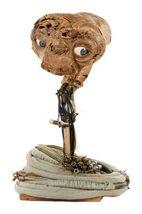 E.T. The Extra Terrestrial | Mechanical Animatronic Head (With DVD): The original Carlo Rambaldi mechanical animatronic head of "E.T.," from the Steven Spielberg film, E.T. the Extra Terrestrial (Universal Pictures, 1982). This original production animatronic