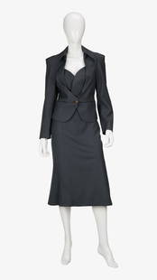 Vivienne Westwood | Grey Wool Skirt Suit: Lot 38: Vivienne Westwood | Grey Wool Skirt Suit A Vivienne Westwood Red Label grey wool skirt suit with a single-breasted blazer and a mid-length pencil skirt.&nbsp; An intricate Westwood skirt suit