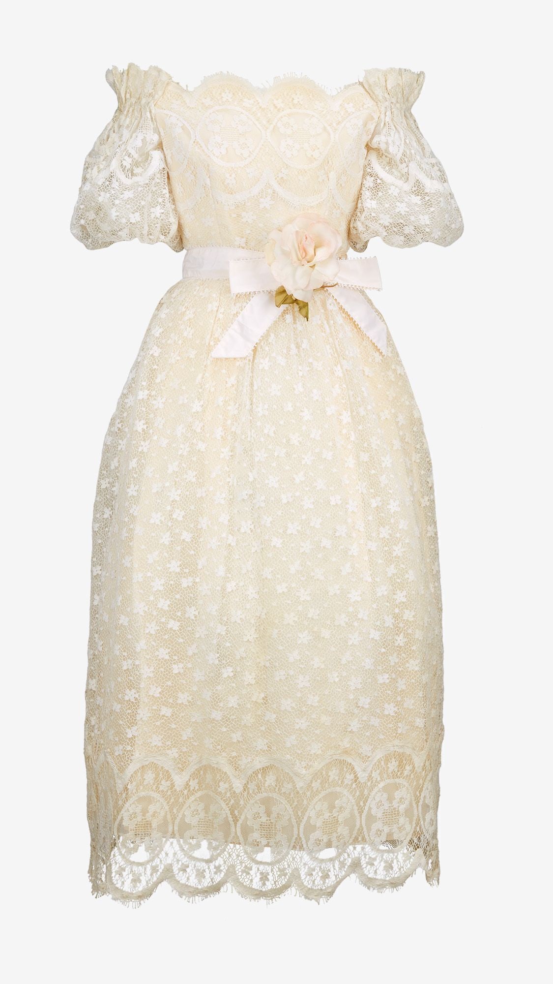 Victor Costa | Cotton Lace Full-Length Day Dress: Lot 58: Victor Costa | Cotton Lace Full-Length Day Dress A Victor Costa cream cotton lace full-length day dress with an ivory faille silk belt and pink rose. An off-the-shoulder cream cotton-lace dres