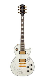 5 Seconds of Summer | Signed Gibson Les Paul Custom - Alpine White VOS Guitar: A 2020 Gibson Custom Les Paul Custom electric guitar, serial number 203065, in Alpine White finish with block inlays, black plastics, and gold hardware. The guitar is signed on the body by 5 Seconds