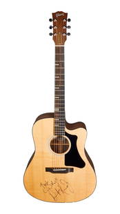 Dermot Kennedy | Signed Gibson G-Writer EC Guitar: A Gibson G-Writer Generation acoustic guitar, serial number 20483016, in a Natural finish, in gig bag. Irish singer-songwriter Dermot Kennedy was photographed signing the body of the guitar "Best