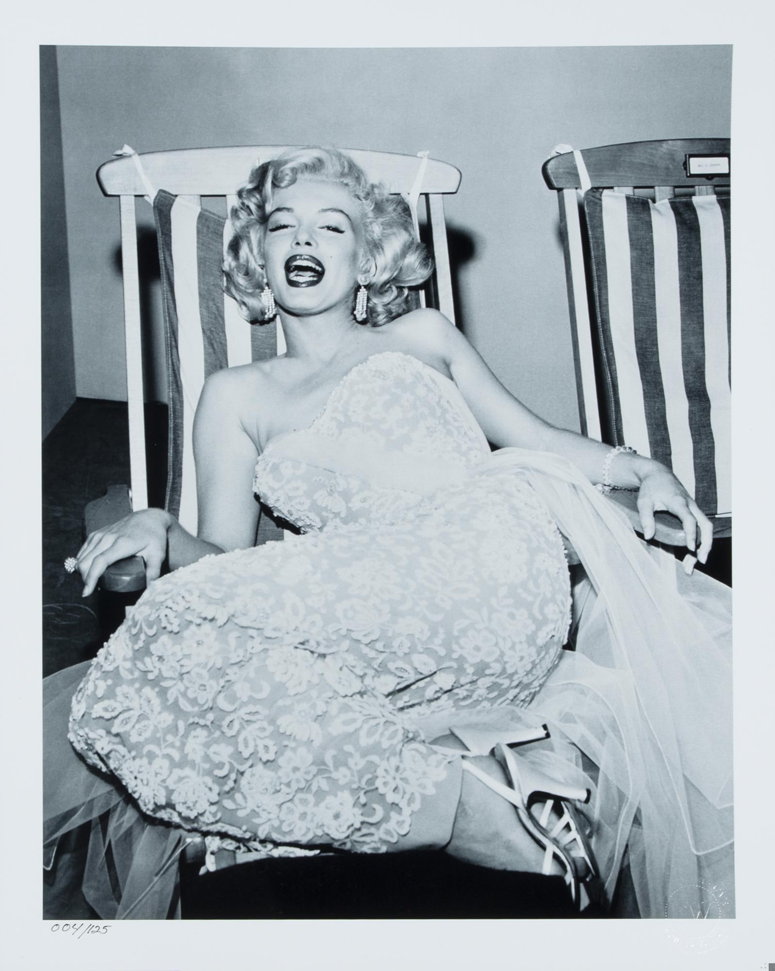 Marilyn Monroe | Frank Worth Oversized Floral Dress Print: A 2000s era later print with a semi-gloss finish, depicting the star looking sexy on the set of the CBS Television show The Jack Benny Program, numbered in the lower left corner "004/125" an