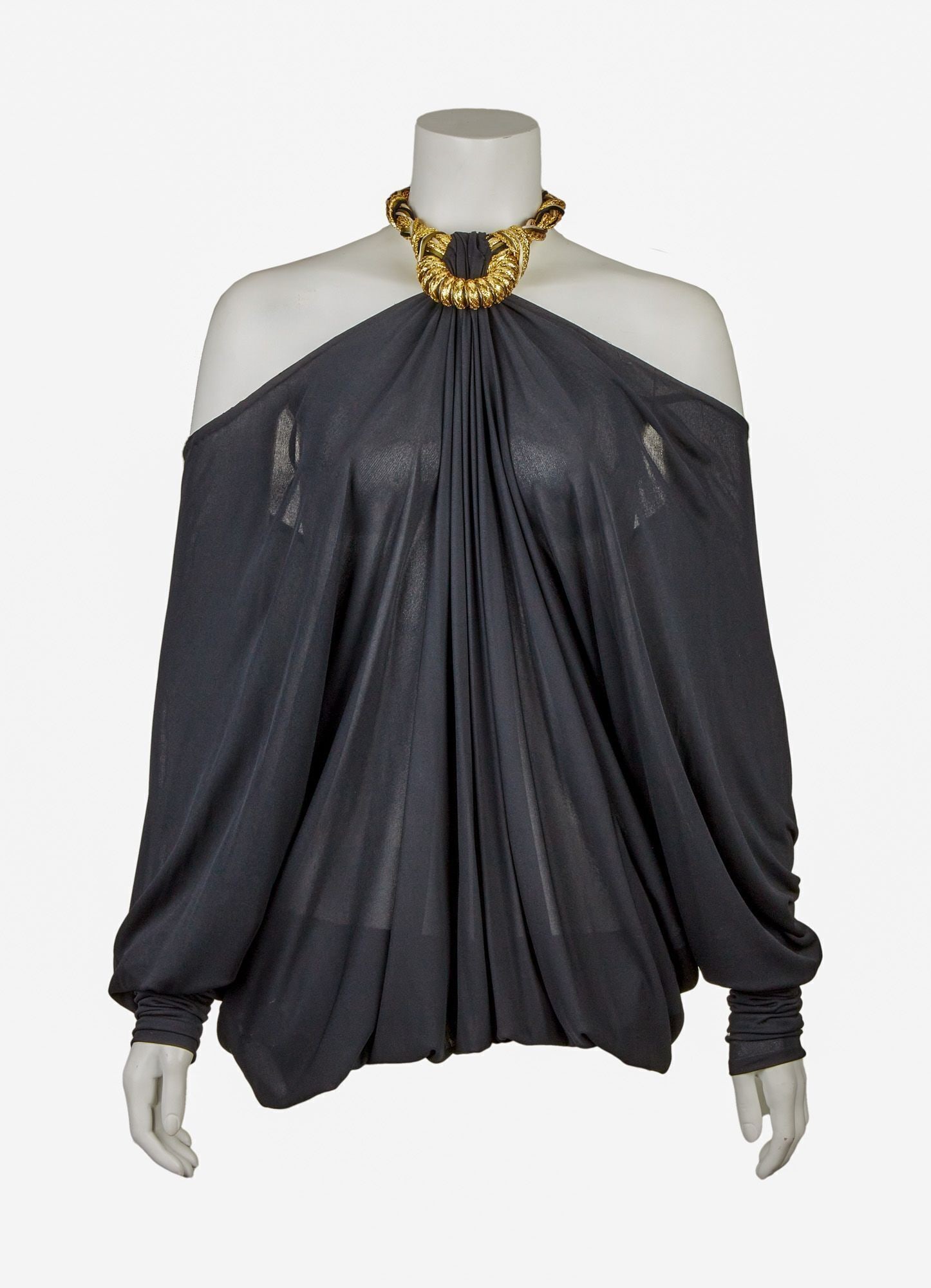Raquel Welch | Event-Worn Givenchy Blouse With And Photo: A Givenchy black silk off-the-shoulder blouse with a gold roped halter-neck. The blouse is unstructured and has an elasticated hem which brings in the blouse and creates volume, creating a bubble effe