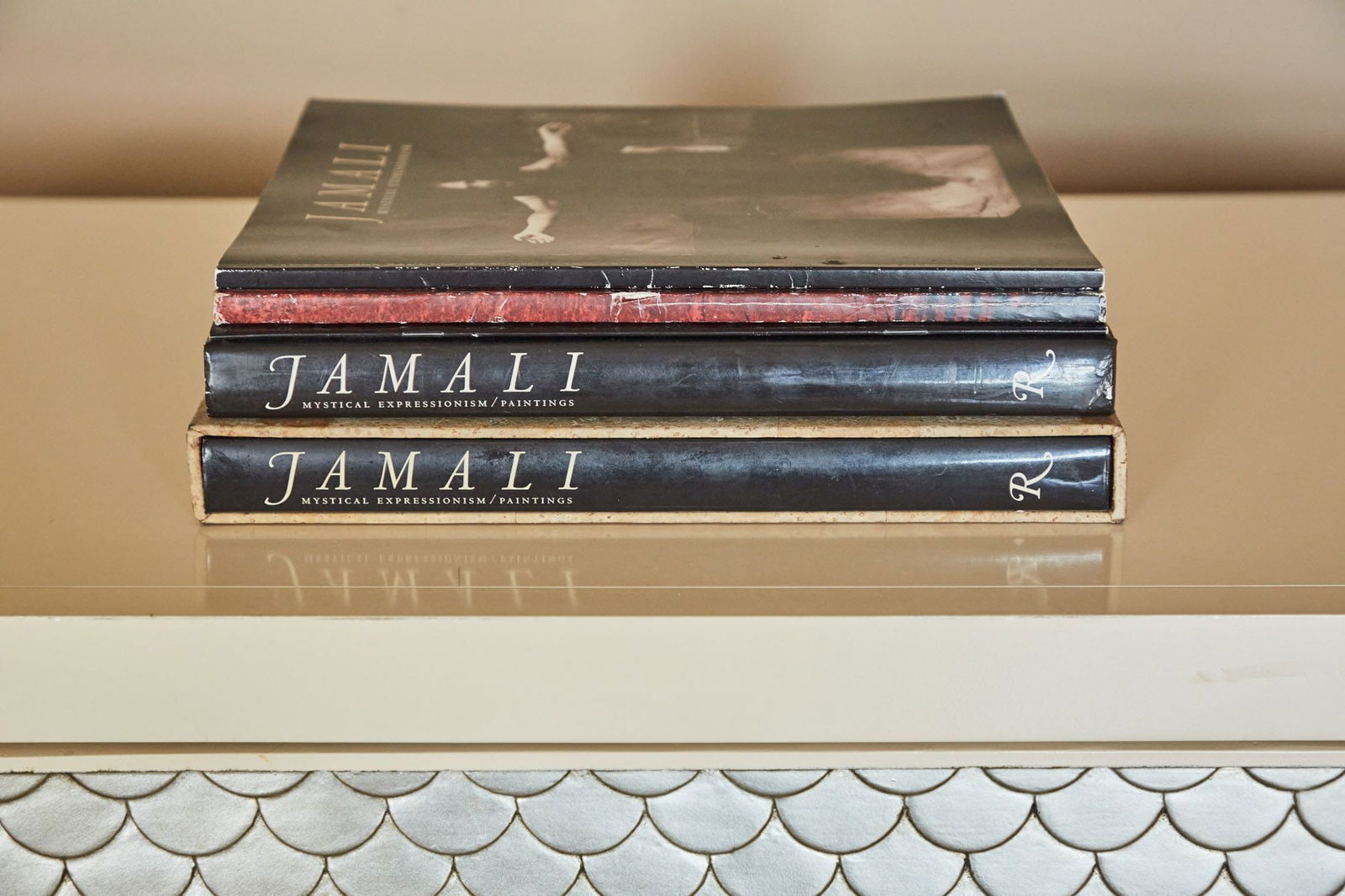 Raquel Welch | Books About Artist Jamali: A group of five books related to the work of avant-garde artist Jamali, including Jamali: Mystical Expressionism/Paintings (Rizzoli, 1997) in its original slipcase. Largest, 12 x 12 x 1 inches PROVENA