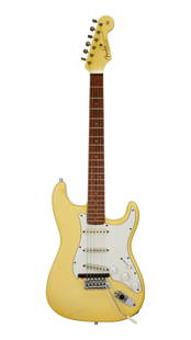 Mike Rutherford | Fender Strat Electric Guitar: A Stratocaster style body with a Rosewood Schecter neck in an aged Olympic White finish. Owned and played by Mike Rutherford, guitarist and bassist for Genesis. An all-rosewood Schecter neck with a 25