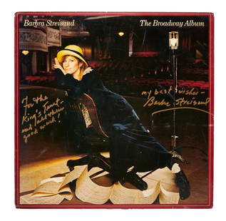 Barbra Streisand | Signed "The Broadway Album" Album: The star's 1985 album featuring an image of her inside a Broadway theatre, with a lengthy inscription by the star in gold felt-tip ink related to the charity. 12 x 12 inches PROVENANCE Donated by Barb