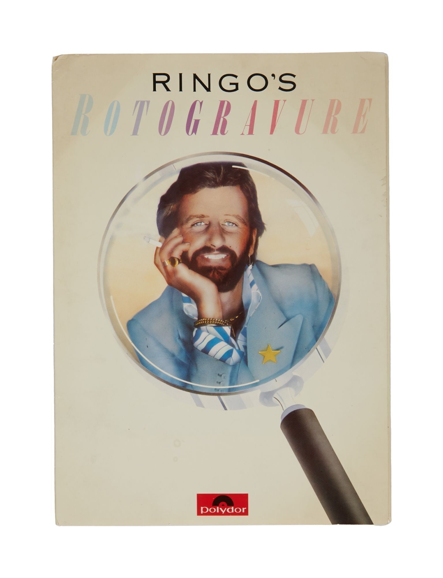 The Julian Lennon Collection | Ringo Starr "Ringo's Rotogravure" Press Pack: Promotion pack for Ringo Starr's album "Ringo's Rotogravure', 1976. 12.25 x 8.75 inches (overall) A portion of the sale proceeds from this lot will be donated to The White Feather Foundation. PROVENAN