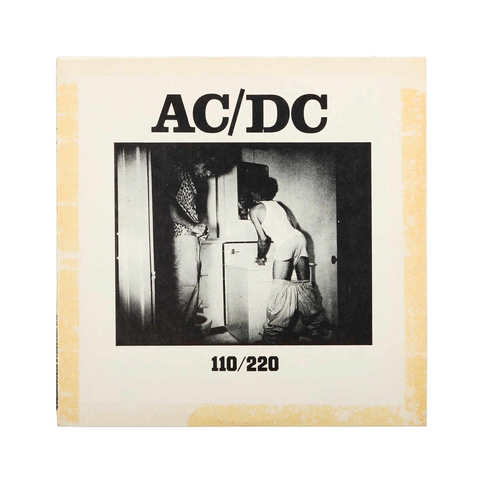 AC/DC | Bon Scott And Band Signed "110/220" Record Album With Photos: A privately released AC/DC record album "110/220" (The Impossible Record Works, IMP 1-31), signed on the back in black ballpoint pen by lead singer Bon Scott, Angus Young, Malcolm Young, Cliff William