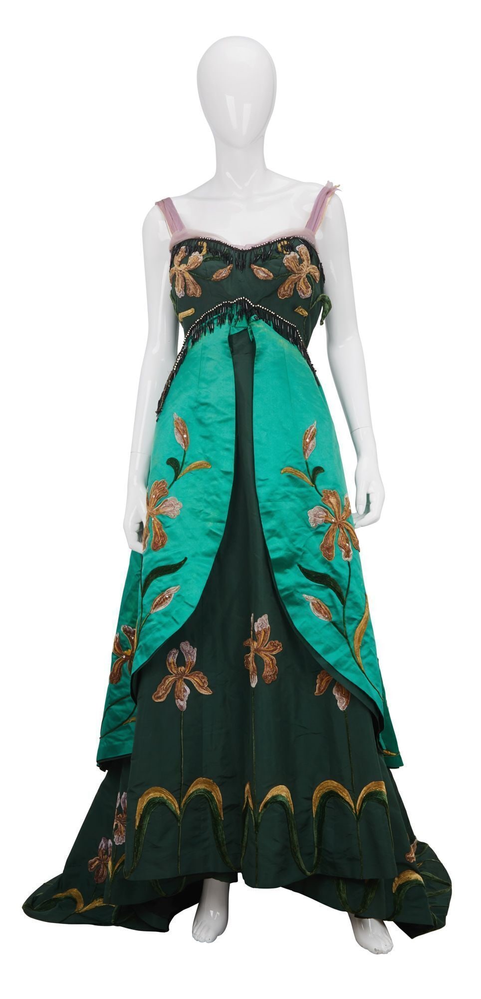 GIGI | Screen-Worn Gown, Designed by Cecil Beaton: A screen-worn evening gown designed by Cecil Beaton for musical/comedy Gigi (MGM 1958), starring Leslie Caron and Maurice Chevalier, and directed by Vincente Minnelli. Full-length emerald green satin