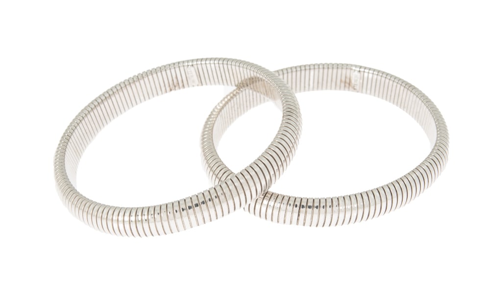 Dorothy Malone | "Mrs. O'Malley And Mr. Malone" Film-Worn Bracelets: A pair of flexible, sterling silver snake-link bracelets, designed by Joseff of Hollywood.Worn by Dorothy Malone in Mrs. O'Malley and Mr. Malone (Metro-Goldwyn-Mayer, 1950). About The Joseff Archi