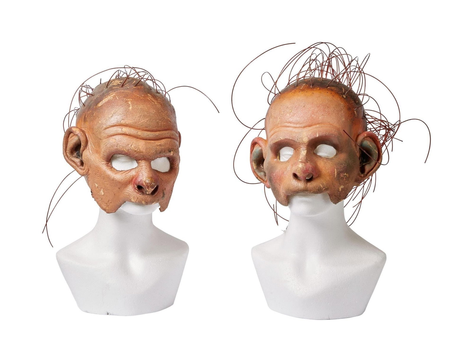 Wicked | Winged Monkey Masks: A pair of monkey masks from the hit stage musical Wicked. The Winged Monkeys feature heavily throughout the show and are highly memorable aspects of the production. Constructed of a flexible thic
