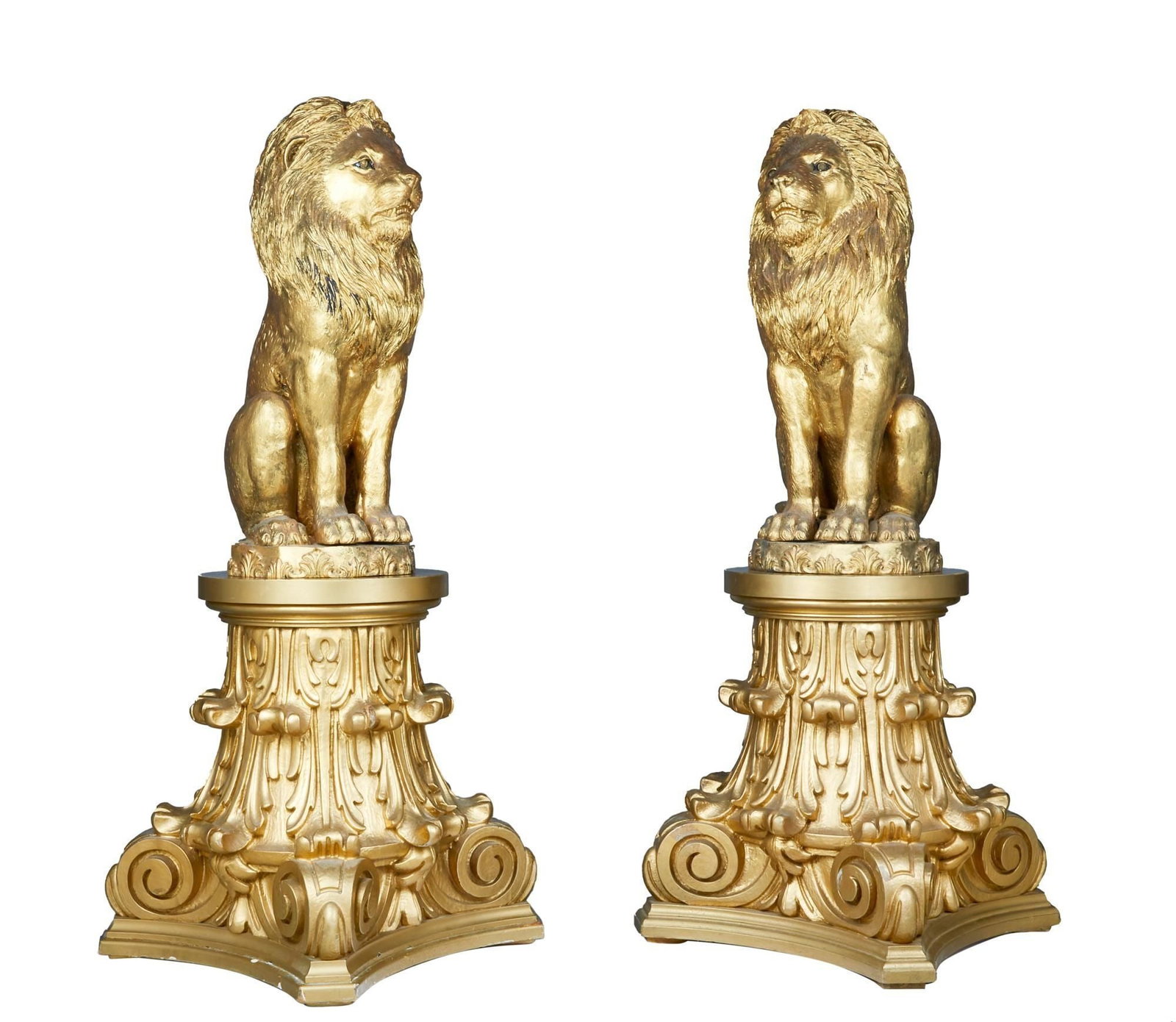 Rick Ross | Georgia Mansion "Gold" Entryway Lion Sculptures: A pair of brass lion sculptures, painted in gold, together with a pair of carved gilt-wood capitals. These sculptures were displayed flanking the front door entrance to Rick Ross's "Promise Land" home