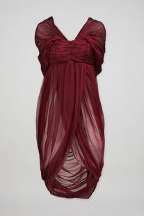 Alexander McQueen | 2008 Sheer Silk Chiffon Evening Dress: This is an Alexander McQueen crimson sheer silk chiffon evening dress from fall 2008. The silk chiffon is cut on the bias and has a ruched empire bust and draped skirt with an asymmetric draped openin