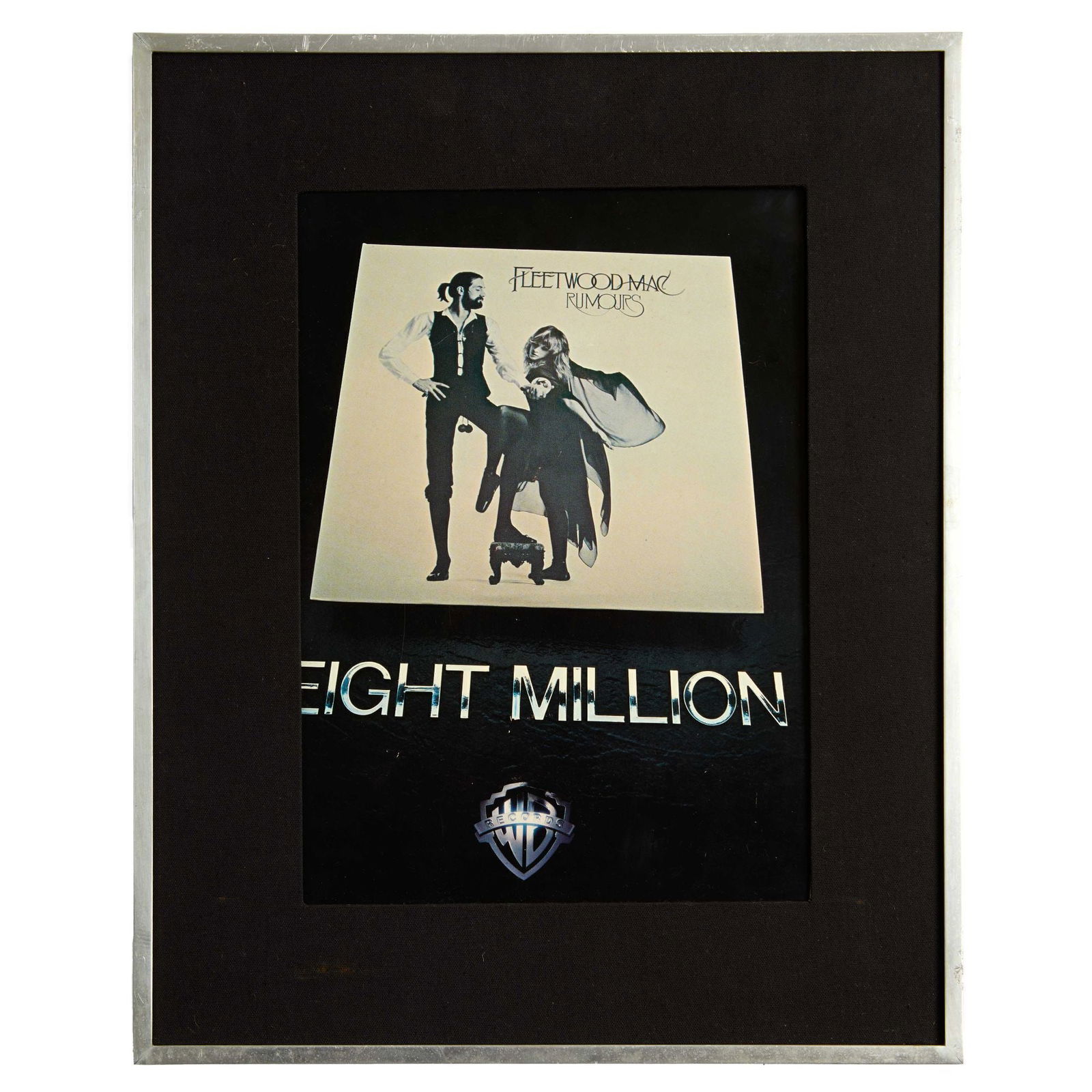 Christine McVie | Fleetwood Mac "Rumours" "Eight Million" Framed Display: A Warner Records printed advert commemorating Fleetwood Mac album Rumours with text that reads "EIGHT MILLION." The RIAA certified eight million copies of the album Rumours sold on October 22, 1984. F