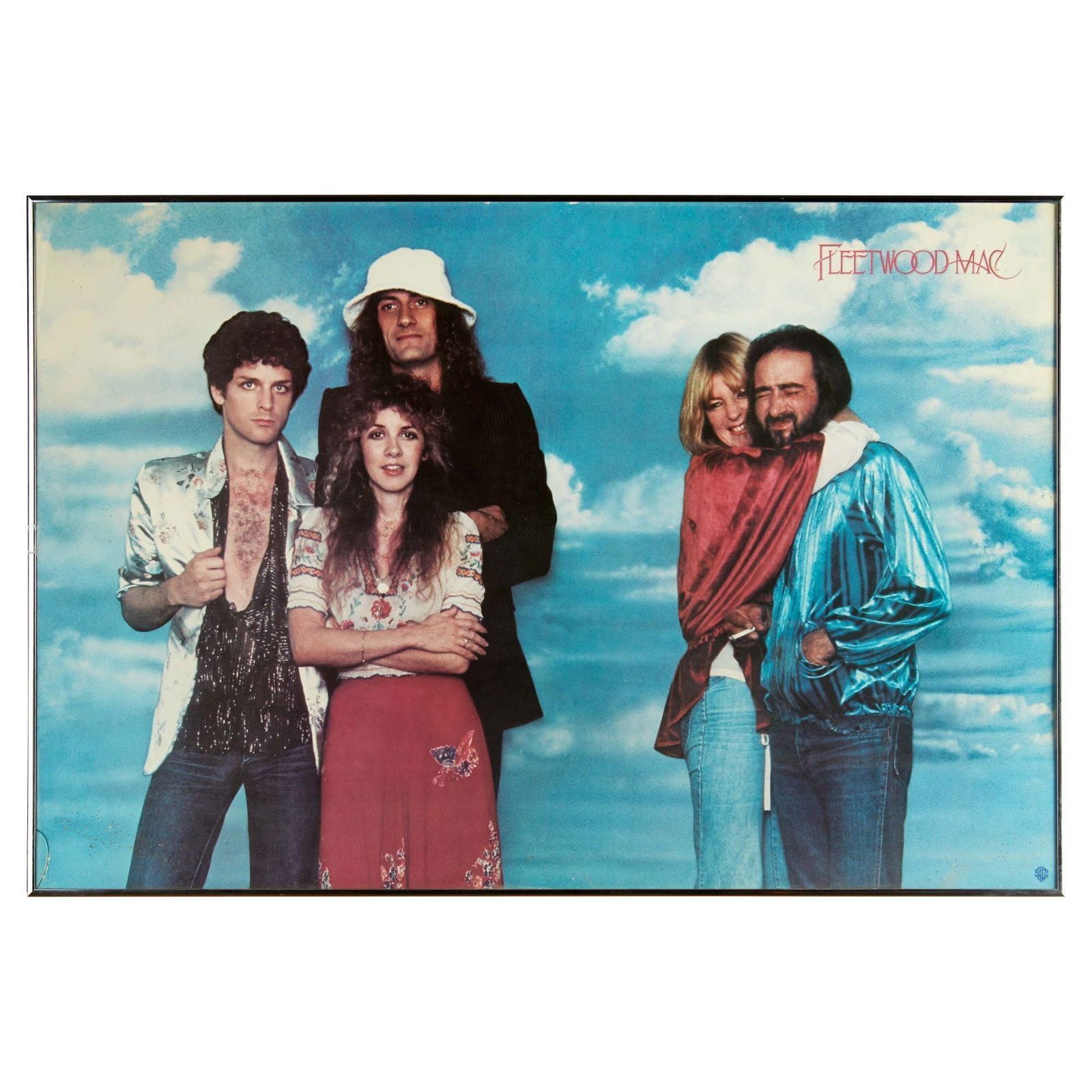 Christine McVie | Warner Music Fleetwood Mac Personality Poster: A Warner Music personality poster showing a color image of Fleetwood Mac used on the cover of their 1979 single "Sisters of the Moon," framed. Overall 23 x 24 inches PROVENANCE: Property From The Life