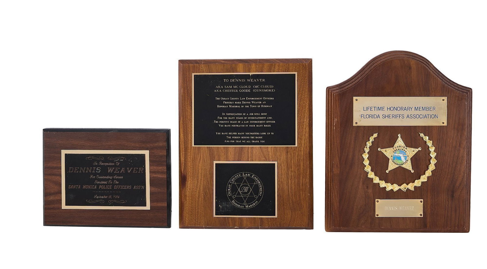 Dennis Weaver | Law Enforcement Plaque Group: A group of three plaques presented to Dennis Weaver by various law enforcement agencies. Included in this grouping is an "Honorary Marshal" plaque presented to Dennis Weaver from Ouray County Law Enfo