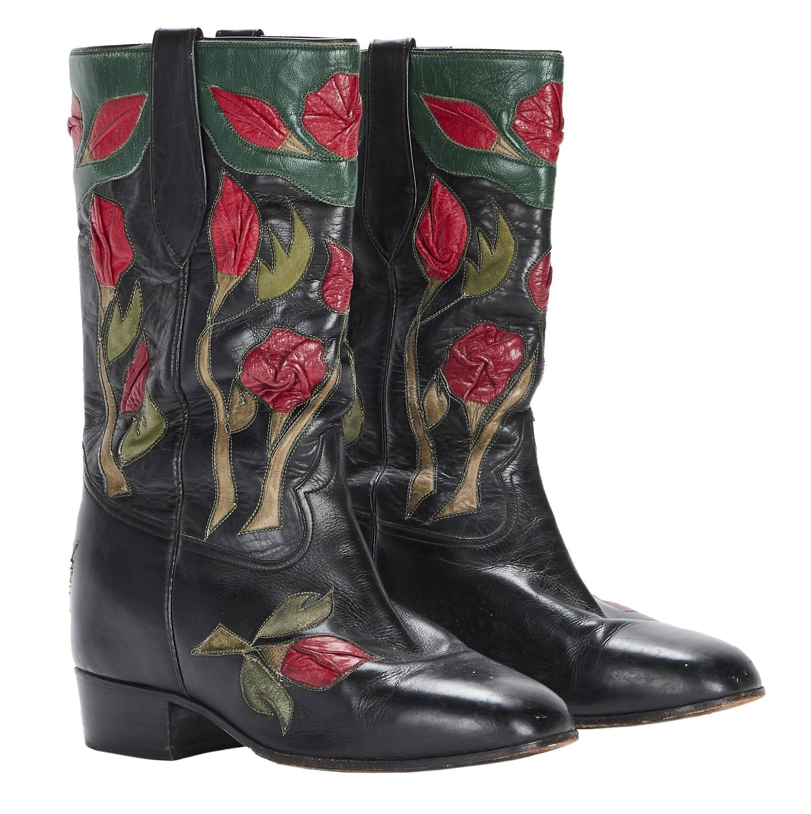 Burt Reynolds | Roses Cowboy Boots: A pair of DiFabrizio black leather cowboy boots with rose-shaped red and green leather accents and Biltrite sole heels, no size present. PROVENANCE From the Estate of Burt Reynolds Boots, Clothing, Bu