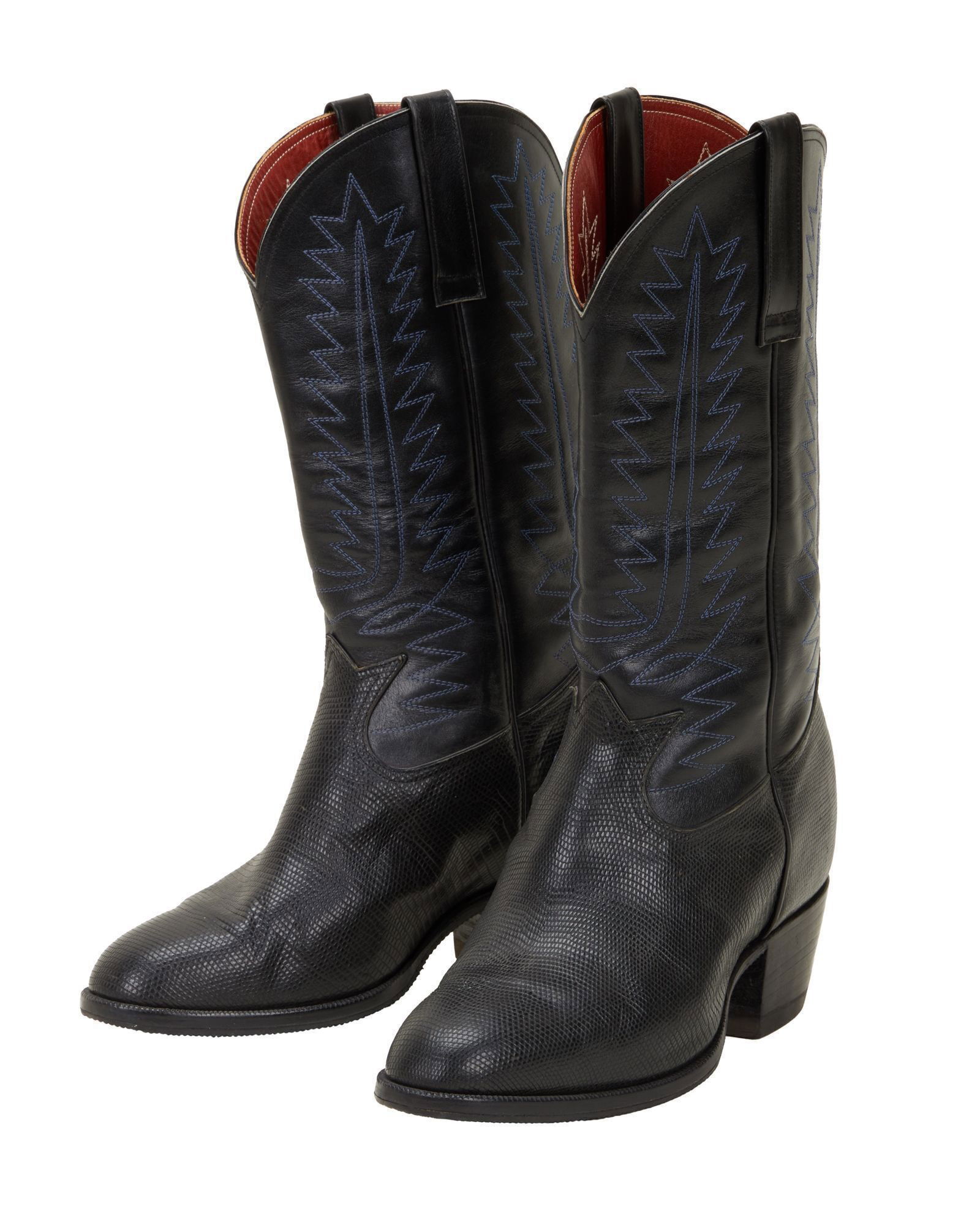 Burt Reynolds | Black Cowboy Boots: A pair of black textured leather boots with blue stitching and neoprene sole heels. O'Sullivan stamp to heel, no size apparent. PROVENANCE Lot 420, "Property From The Estate of Burt Reynolds," Julien'