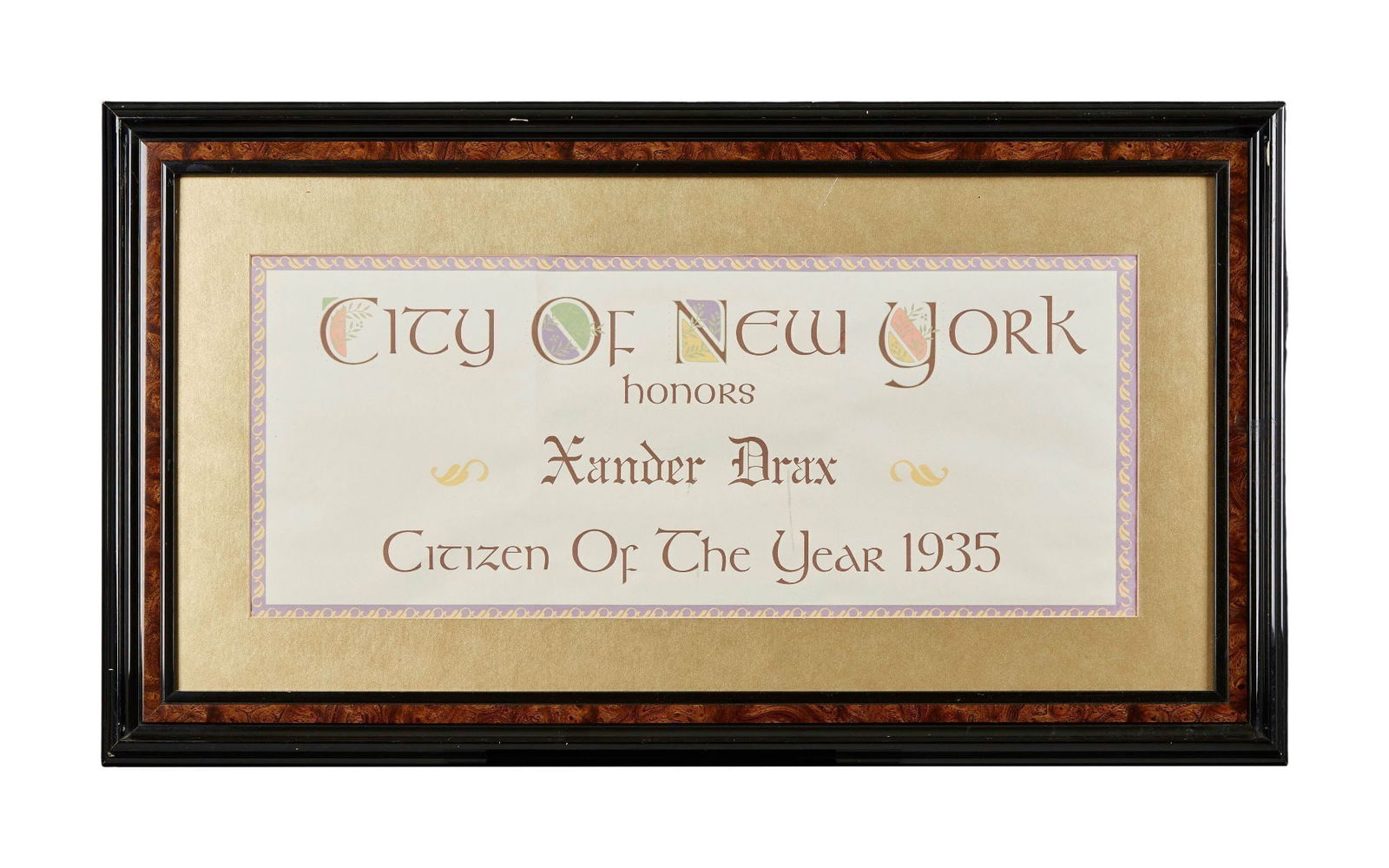 The Phantom | Treat Williams "Xander Drax" "New York Citizen of the Year 1935" Framed Prop: A framed award used as a set dressing prop from the production of the action-adventure superhero film The Phantom (Paramount, 1996). The award is paper featuring the printed words: "City of New York /