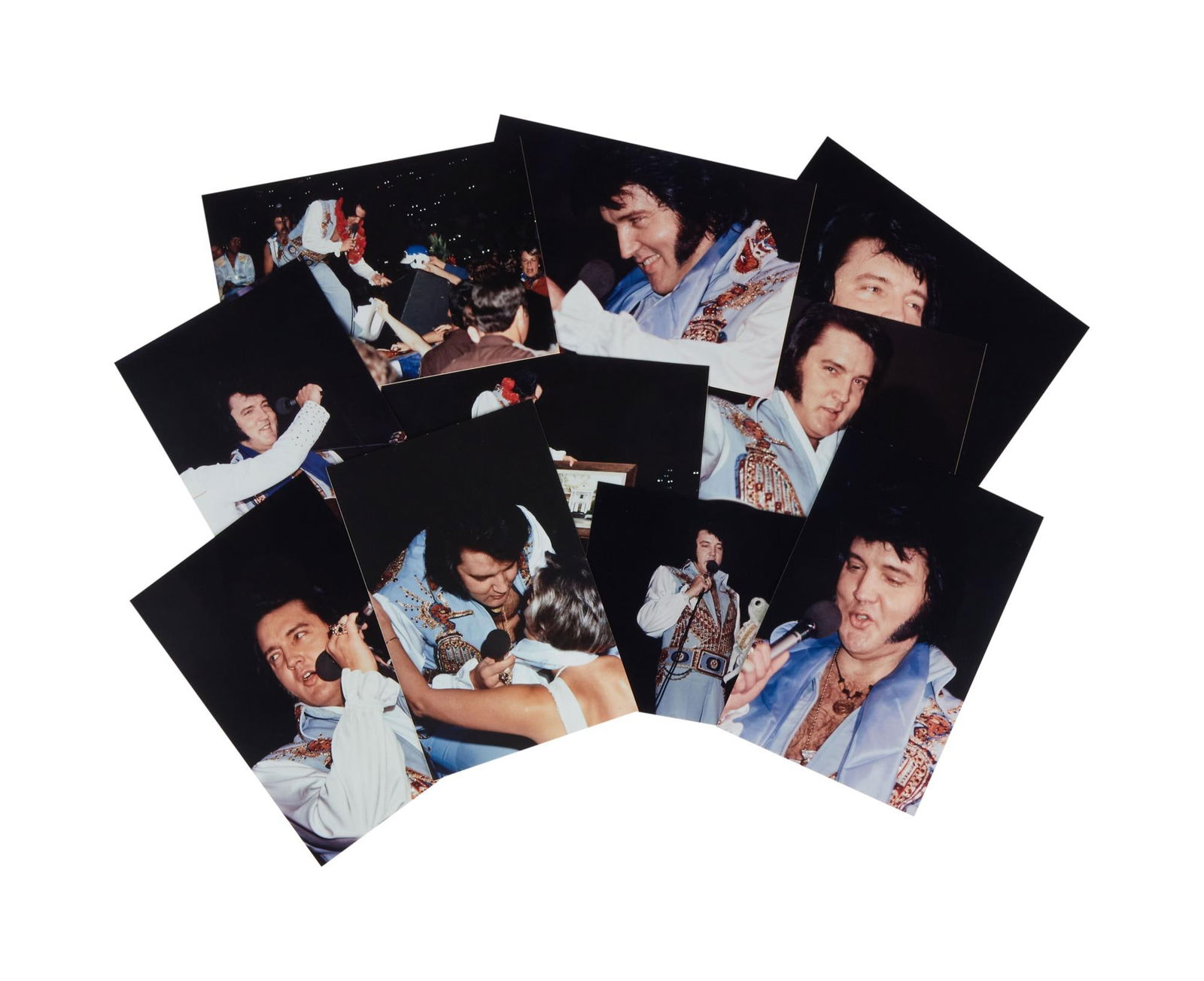 Elvis Presley | 1976 Unpublished Macon, Georgia Concert Photos: A group of 10 unpublished photographs of Elvis Presley performing in concert in Macon, GA on August 31, 1976. One of the photographs is stamped "In Concert Photos - Derek Phillips" with an a