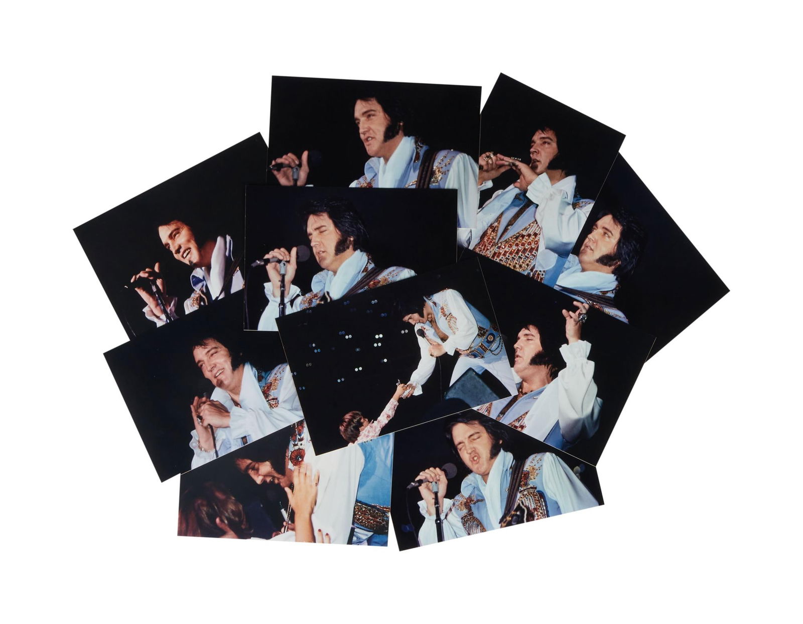 Elvis Presley | 1976 Unpublished Macon, Georgia Concert Photos: A group of 10 unpublished photographs of Elvis Presley performing in concert in Macon, GA on August 31, 1976. One of the photographs is stamped "In Concert Photos - Derek Phillips" with an a
