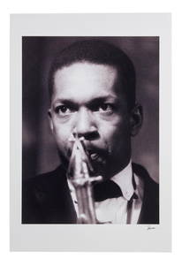 The Julian Lennon Collection | Robert Freeman 1960 John Coltrane Photo Print: A black and white photo print of John Coltrane playing the saxophone, c. 1960s, taken by photographer Robert Freeman. Signed on the bottom right in silver marker by Freeman. Chromogenic C Type pr