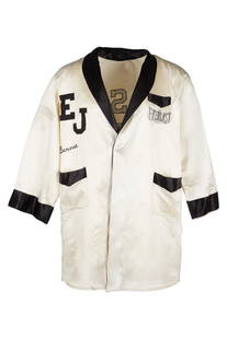Elton John | Bernie Taupin 1976 Madison Square Garden Personalized Tour Robe: A cream satin boxing-style robe with black accents, personalized to Bernie Taupin for Elton John's series of seven sold out shows at Madison Square Garden in New York City, from the 10th of August